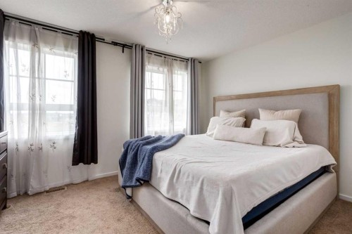 215 Copperpond Common Se, Calgary, AB - Indoor Photo Showing Bedroom
