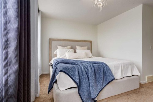 215 Copperpond Common Se, Calgary, AB - Indoor Photo Showing Bedroom