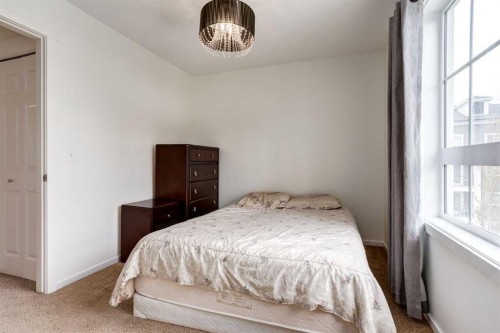 215 Copperpond Common Se, Calgary, AB - Indoor Photo Showing Bedroom