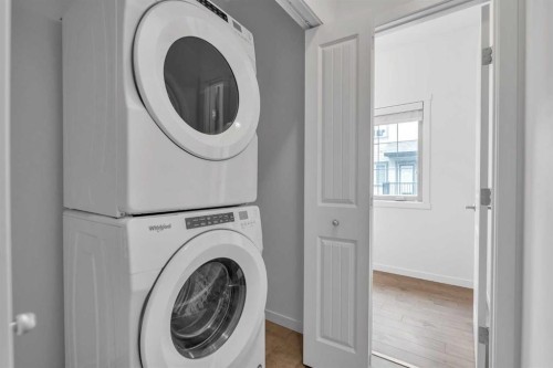 131 Legacy Point Se, Calgary, AB - Indoor Photo Showing Laundry Room