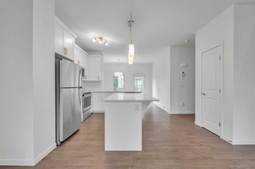 131 Legacy Point Se, Calgary, AB - Indoor Photo Showing Kitchen With Upgraded Kitchen