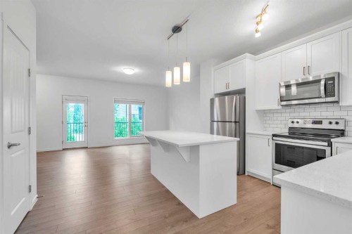 131 Legacy Point Se, Calgary, AB - Indoor Photo Showing Kitchen With Stainless Steel Kitchen With Upgraded Kitchen