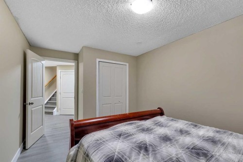 135 Panatella Close Nw, Calgary, AB - Indoor Photo Showing Bedroom