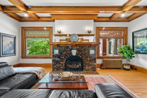 1933 5 Street Sw, Calgary, AB - Indoor Photo Showing Living Room With Fireplace