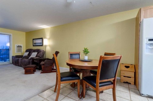 406-99 Westview Drive, Nanton, AB - Indoor Photo Showing Dining Room