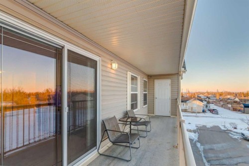 406-99 Westview Drive, Nanton, AB - Outdoor With Balcony With Exterior