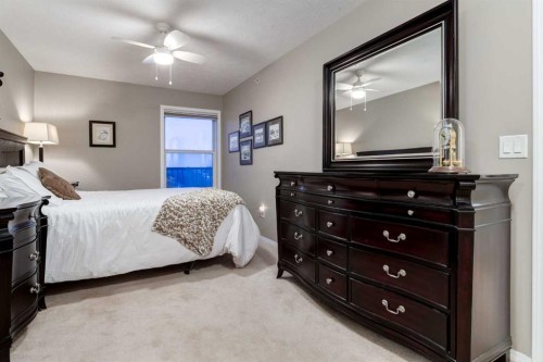 406-99 Westview Drive, Nanton, AB - Indoor Photo Showing Bedroom