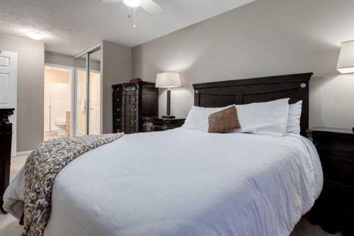 406-99 Westview Drive, Nanton, AB - Indoor Photo Showing Bedroom