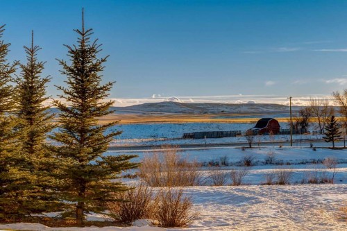 406-99 Westview Drive, Nanton, AB - Outdoor With Body Of Water With View