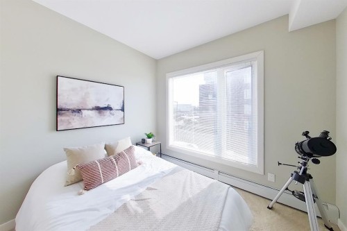 2203-604 East Lake Boulevard Ne, Airdrie, AB - Indoor Photo Showing Bedroom