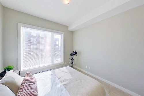2203-604 East Lake Boulevard Ne, Airdrie, AB - Indoor Photo Showing Bedroom