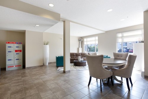 2203-604 East Lake Boulevard Ne, Airdrie, AB - Indoor Photo Showing Dining Room