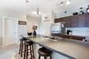 2203-604 East Lake Boulevard Ne, Airdrie, AB  - Indoor Photo Showing Kitchen With Double Sink 