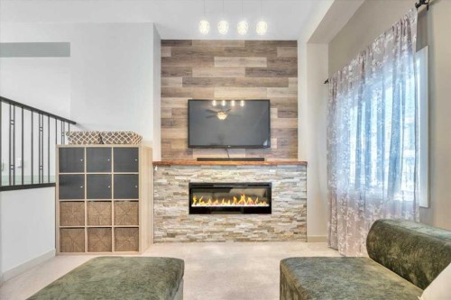 124 Strathcona Circle, Strathmore, AB - Indoor Photo Showing Other Room With Fireplace