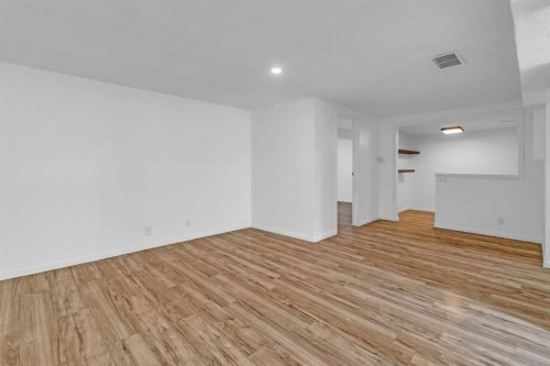 10 Radcliffe Crescent Se, Calgary, AB - Indoor Photo Showing Other Room