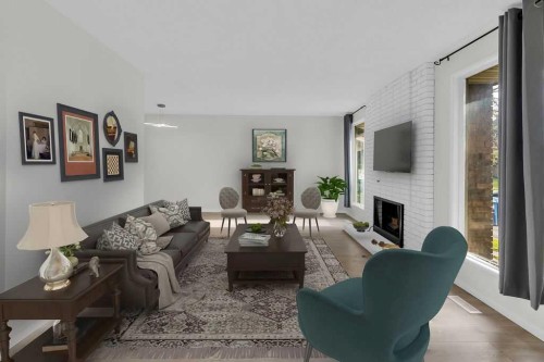 10 Radcliffe Crescent Se, Calgary, AB - Indoor Photo Showing Living Room With Fireplace