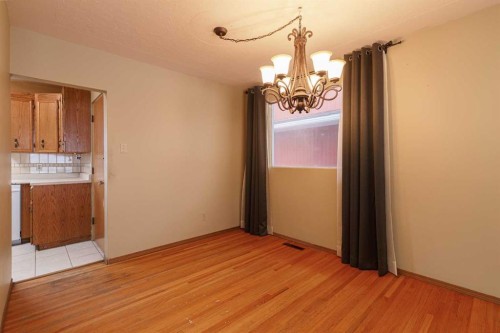 6123 Lacombe Way Sw, Calgary, AB - Indoor Photo Showing Other Room