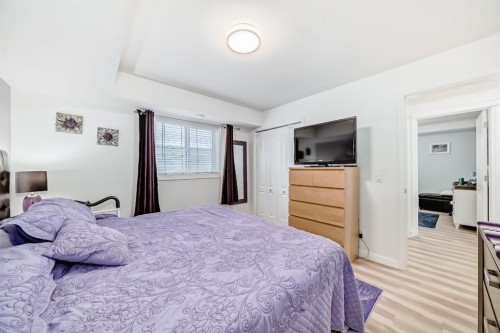 200-8 Bayside Place, Strathmore, AB - Indoor Photo Showing Bedroom