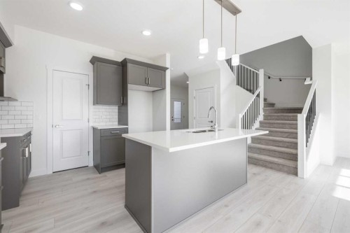 89 Sora Gardens Se, Calgary, AB - Indoor Photo Showing Kitchen With Upgraded Kitchen