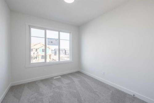89 Sora Gardens Se, Calgary, AB - Indoor Photo Showing Other Room