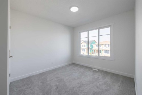 89 Sora Gardens Se, Calgary, AB - Indoor Photo Showing Other Room