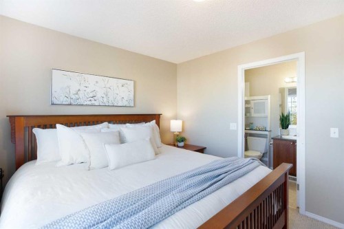 444 Morningside Way Sw, Airdrie, AB - Indoor Photo Showing Bedroom