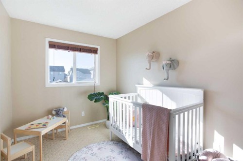 444 Morningside Way Sw, Airdrie, AB - Indoor Photo Showing Bedroom