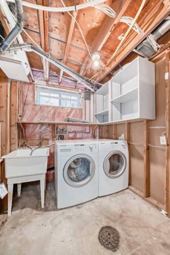 131 Bracewood Road Sw, Calgary, AB - Indoor Photo Showing Laundry Room