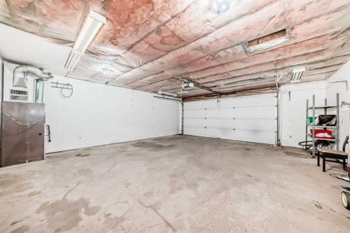 131 Bracewood Road Sw, Calgary, AB - Indoor Photo Showing Garage