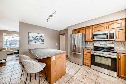 131 Bracewood Road Sw, Calgary, AB - Indoor Photo Showing Kitchen With Stainless Steel Kitchen
