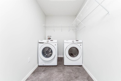 1410-33 Carringham Gate Nw, Calgary, AB - Indoor Photo Showing Laundry Room