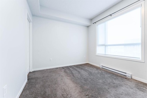 1410-33 Carringham Gate Nw, Calgary, AB - Indoor Photo Showing Other Room