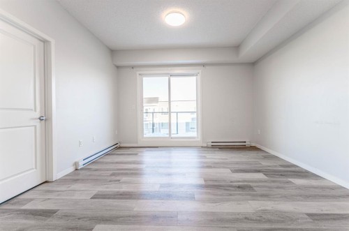 1410-33 Carringham Gate Nw, Calgary, AB - Indoor Photo Showing Other Room