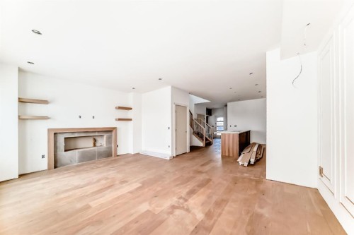 116 Heritage Manor, Cochrane, AB - Indoor With Fireplace