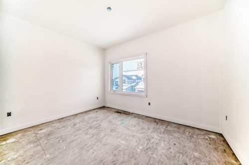 116 Heritage Manor, Cochrane, AB - Indoor Photo Showing Other Room