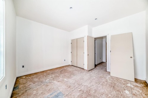 116 Heritage Manor, Cochrane, AB - Indoor Photo Showing Other Room