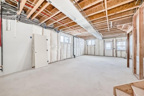 116 Heritage Manor, Cochrane, AB - Indoor Photo Showing Basement