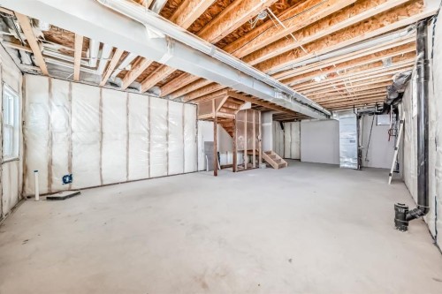 116 Heritage Manor, Cochrane, AB - Indoor Photo Showing Basement