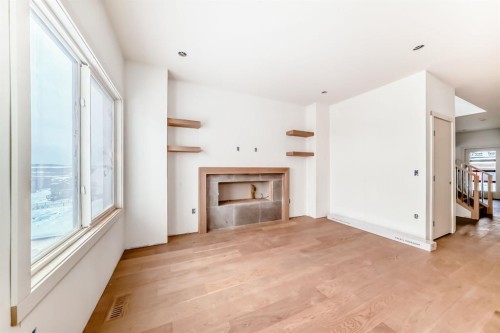 116 Heritage Manor, Cochrane, AB - Indoor With Fireplace