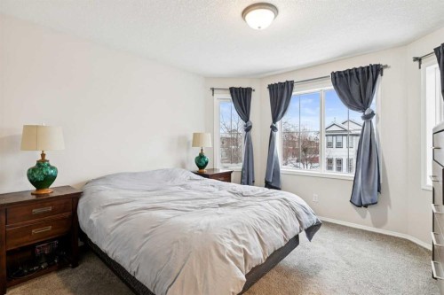 45 Prestwick Rise Se, Calgary, AB - Indoor Photo Showing Bedroom