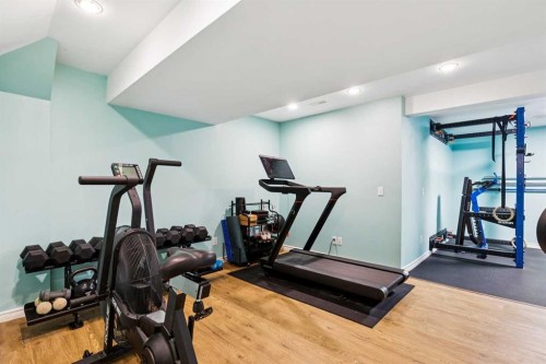 45 Prestwick Rise Se, Calgary, AB - Indoor Photo Showing Gym Room