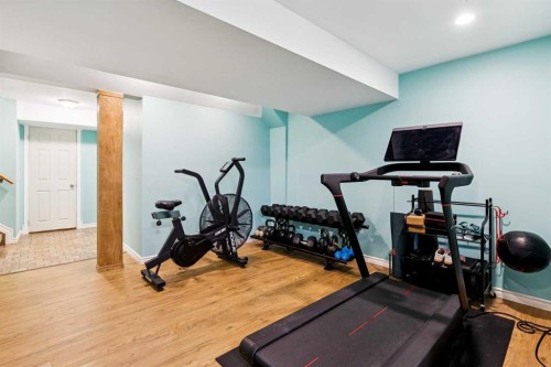 45 Prestwick Rise Se, Calgary, AB - Indoor Photo Showing Gym Room