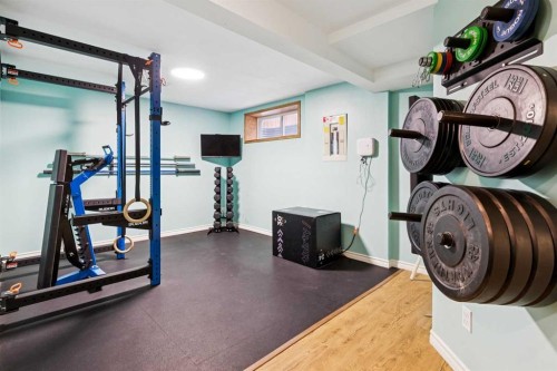 45 Prestwick Rise Se, Calgary, AB - Indoor Photo Showing Gym Room