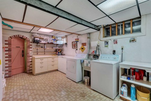 5602 Dalcastle Hill Nw, Calgary, AB - Indoor Photo Showing Laundry Room