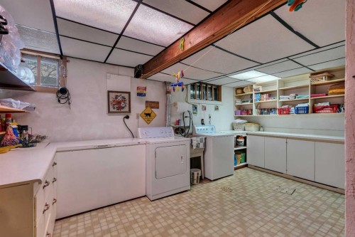 5602 Dalcastle Hill Nw, Calgary, AB - Indoor Photo Showing Laundry Room