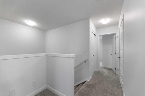 137-137 Red Embers Link Ne, Calgary, AB - Indoor Photo Showing Other Room