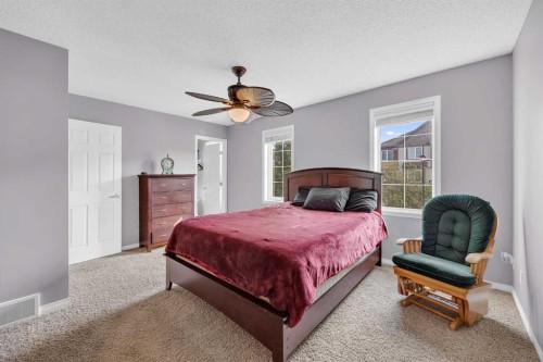 126 Windstone Avenue Sw, Airdrie, AB - Indoor Photo Showing Bedroom