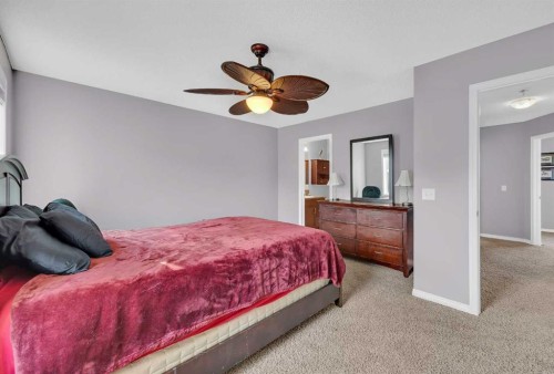 126 Windstone Avenue Sw, Airdrie, AB - Indoor Photo Showing Bedroom