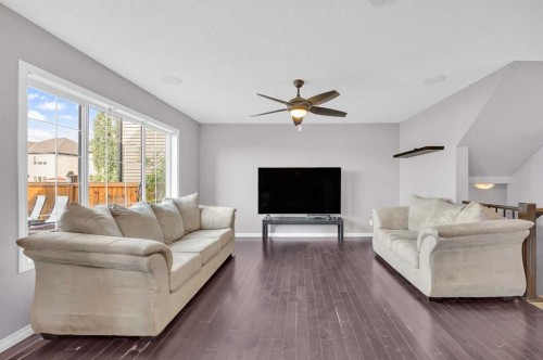 126 Windstone Avenue Sw, Airdrie, AB - Indoor Photo Showing Living Room