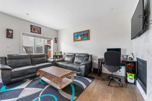 235 Saddlestone Grove Ne, Calgary, AB - Indoor Photo Showing Living Room